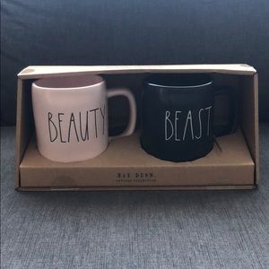 Rae Dunn’s “beauty/beast” mug set